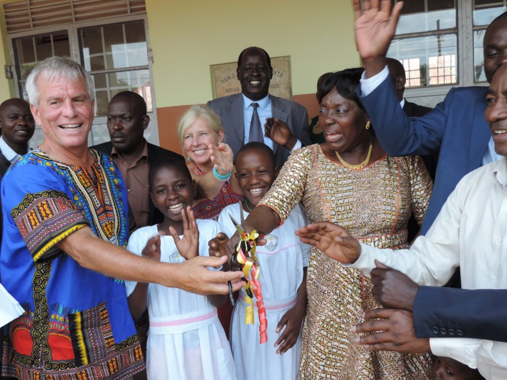 Ribbon cutting of the new classroom building with then Speaker of National Parliament, the Right Honorable Rebecca Kadaga